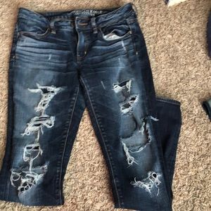 Extremely distressed American Eagle Size 4